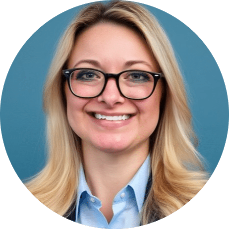 Amber Beck-modified Smiling woman with long blonde hair, wearing black glasses and a blue collared shirt, posed in front of a solid blue background.
